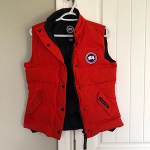 Canada Goose Vest - reddish orange in colour Size S.  Barely worn.
